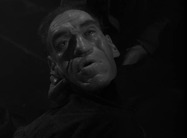 The Creeper (Rondo Hatton) is pulled from the river half-drowned in Jean Yarbrough's House of Horrors (1946)