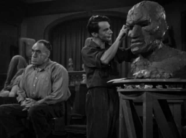 The Creeper (Rondo Hatton) poses for sculptor Marcel De Lange (Martin Kosleck)'s masterpiece in Jean Yarbrough's House of Horrors (1946)