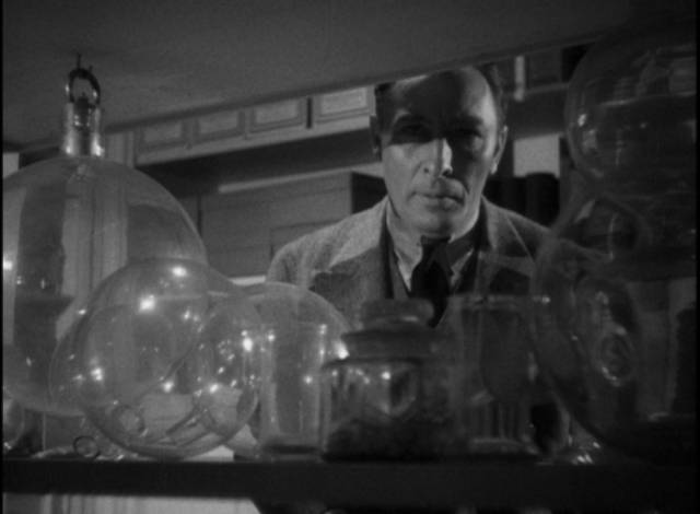 Eric Gorman (Lionel Atwill) lurks in the zoo laboratory in A. Edward Sutherland's Murders in the Zoo (1933)