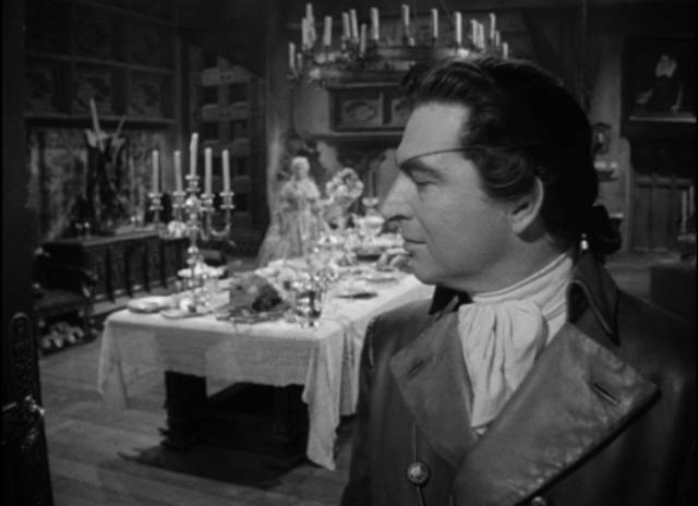 The sadistic Count Karl von Bruno (Stephen McNally) seeks revenge on Sir Ronald Burton (Richard Greene) in Nathan Juran's The Black Castle (1952)