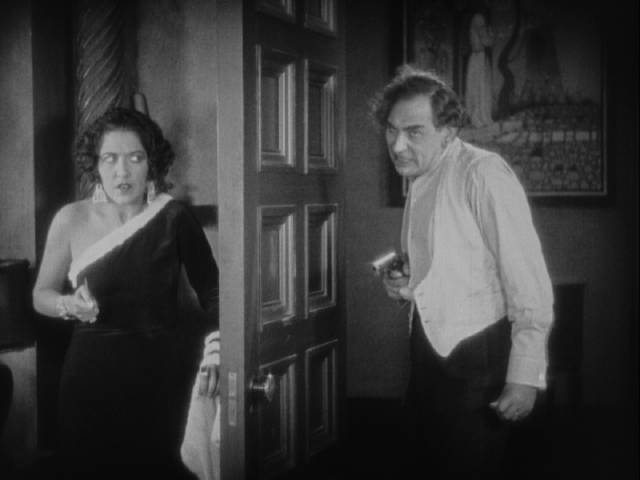 Conspirators Zara (Aileen Pringle) and Zazarack (Mitchell Lewis) lose trust in one another in Tod Browning's The Mystic (1925)