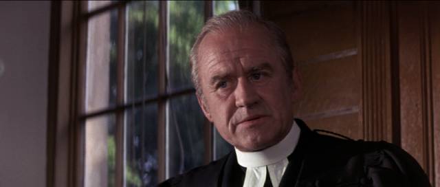 Vicar Julian Ainsley (Cyril Cusack) sees his daughter Janet (Stephanie Beacham) being drawn into danger in Roddy McDowall's The Ballad of Tam Lin (1970)