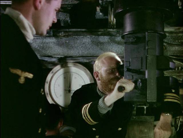 A U-Boat captain decides to use the drifting lifeboat as bait in Pat Jackson's Western Approaches (1944)