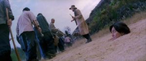 Immigrant Hero Hua (Ekin Cheng) encounters racism in early 20th Century America in Andrew Lau's A Man Called Hero (1999)