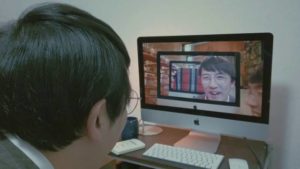 A computer opens a portal in time in Junta Yamaguchi's sci-fi/comedy Beyond the Infinite Two Minutes (2020)