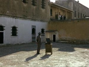 A tense stand-off in a prison illuminates 20th Century Greek political conflicts in Theodoros Angelopoulos' Days of '36 (1972)