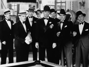 Tony Camonte (Paul Muni)'s brash energy makes his a natural leader in Howard Hawks' Scarface (1932)
