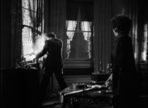 Cesca (Ann Dvorak) finally joins her brother Tony Cramonte (Paul Muni) in his violent world in Howard Hawks' Scarface (1932)
