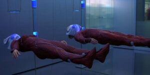 Patient and therapist are linked by computer in a sensory deprivation chamber in Tarsem Singh's The Cell (2000)