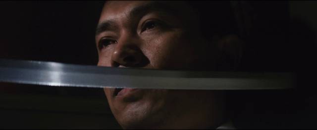 Dr. Amamiya (Noboru Andô) refuses to back down despite threats of violence in Tai Katô’s By a Man’s Face Shall You Know Him (1966)