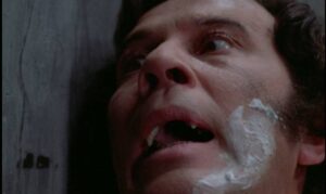 Dr. Marcus (John Carson) realizes he's been infected in Brian Clemens’ Captain Kronos: Vampire Hunter (1974)