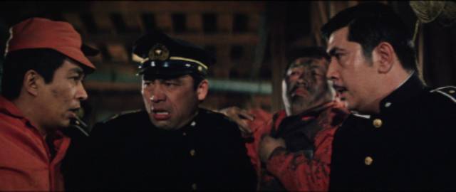 Former soldier Kawada (Noboru Andô) confronts corrupt prison guards in Tai Katô's Eighteen Years in Prison (1967)