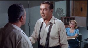 Dr. Xavier (Ray Milland) rejects his friend Dr. Sam Brant (Harold J. Stone)'s warnings in Roger Corman’s X: The Man with the X-Ray Eyes (1963)