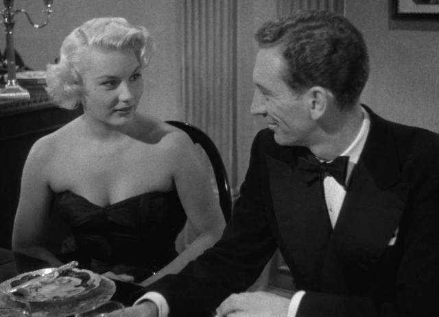 Lena (Barbara Payton) and Robin (John Van Eyssen)'s feelings for each other become impossible to ignore in Terence Fisher's Four Sided Triangle (1953)