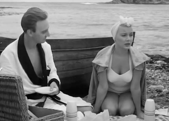 Bill Stephen Murray) remains oblivious of the emotional conflict within the duplicate Lena (Barbara Payton) in Terence Fisher's Four Sided Triangle (1953)