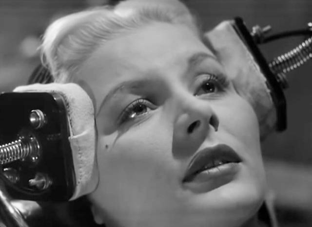 Helen (Barbara Payton) is aware that she's about to sacrifice her own identity to satisfy Bill (Stephen Murray)'s selfish needs in Terence Fisher's Four Sided Triangle (1953)