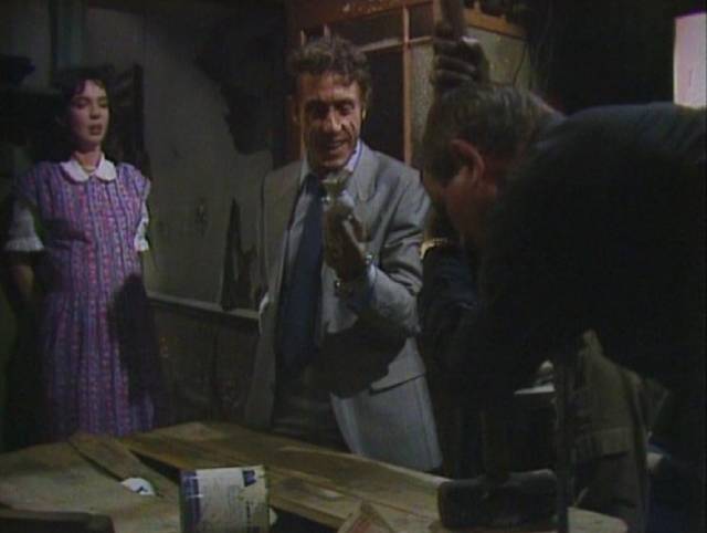 Colin (Roger Daltrey) mocks Gerald (Duncan Preston) and Susannah (Phoebe Nicholls)'s bourgeois pretensions in Nigel Kneale's Gentry (Roy Battersby, 1987)