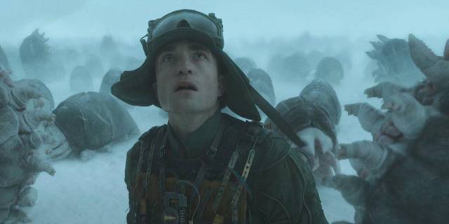 Mickey (Robert Pattinson) tries to save a native species from genocide in Bong Joon-ho's Mickey 17 (2025)