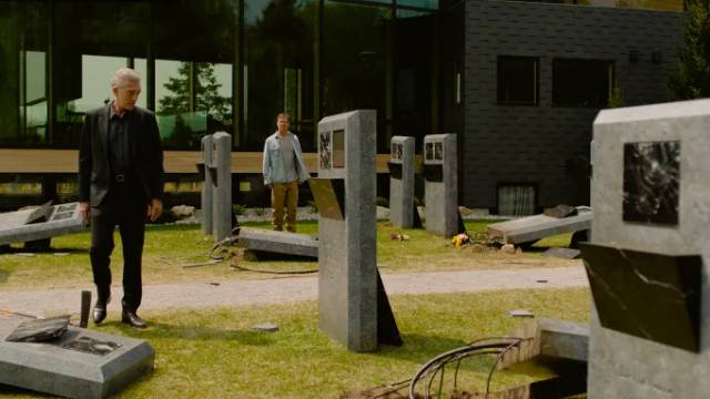 An unknown faction vandalizes the GraveTech cemetery in David Cronenberg's The Shrouds (2024)