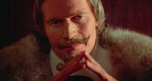 Cardinal Richlieu (Charlton Heston) schemes to rule France in Richard Lester's The Three Musketeers (1973)
