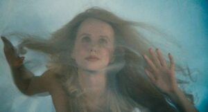 In his dreams Sam Lowry (Jonathan Pryce) fights the Forces of Darkness to rescue his ideal woman in Terry Gilliam's Brazil (1985)