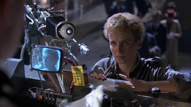 The real Jill Layton (Kim Greist) is nothing like Sam Lowry (Jonathan Pryce)'s fantasy in Terry Gilliam's Brazil (1985)