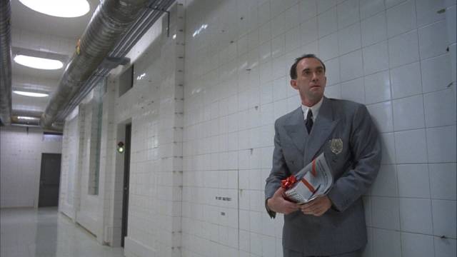Involvement with Jill Layton (Kim Greist) triggers increasing paranoia in Sam Lowry (Jonathan Pryce) in Terry Gilliam's Brazil (1985)