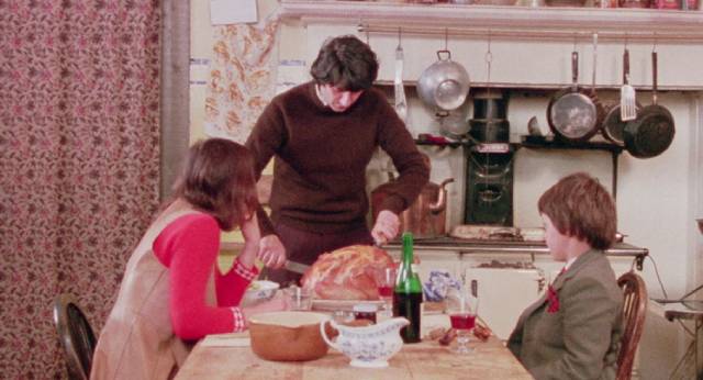 Tom (Tom Conti)'s attempt at a Christmas dinner fails to live up to Geoffrey's standard in Simon Perry's Eclipse (1977)