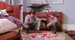 Tom (Tom Conti) tries to bond with his nephew Giles (Gavin Wallace) in Simon Perry's Eclipse (1977)