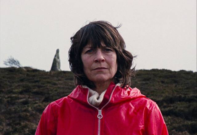 The Volunteer (Mary Woodvine) gradually merges with the island in Mark Jenkin's Enys Men (2022)