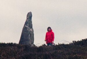 The standing stone embodies the age-old energy of the land in Mark Jenkin's Enys Men (2022)