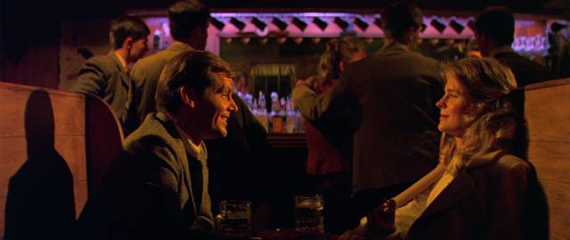 Jonathan (Jack Nicholson) tries to charm Susan (Candice Bergen) into dropping Sandy (Art Garfunkel) for him in Mike Nichols' Carnal Knowledge (1971)