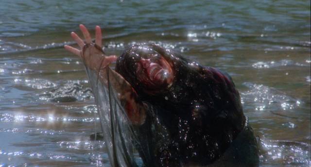 A swimmer is eaten by a giant amoeba in Michael Gornick's Creepshow 2 (1987)