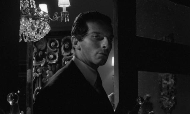 Fing-Su (Pinkas Braun in yellow-face) seeks an artifact to help him conquer the West in Franz Josef Gottlieb's The Curse of the Yellow Snake (1963)