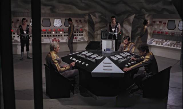 A spaceship responds to a distress call from a distant planet in Gottfried Kolditz’s In the Dust of the Stars (1976)