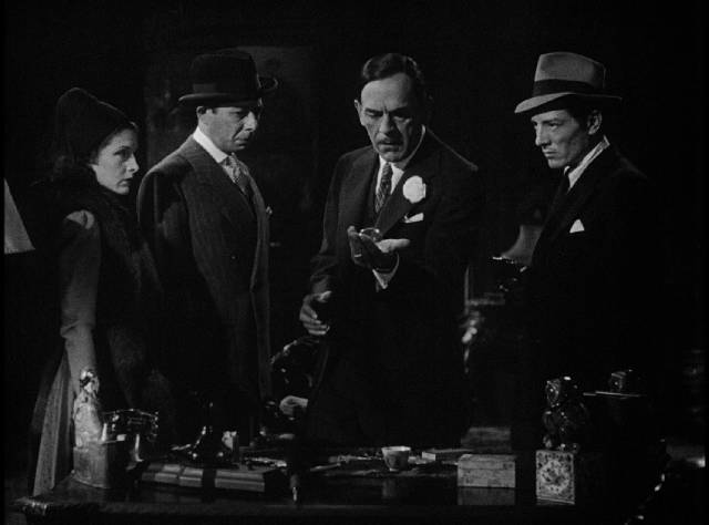 Boris Karloff weighs the evidence in William Nigh's Mr. Wong, Detective (1938)