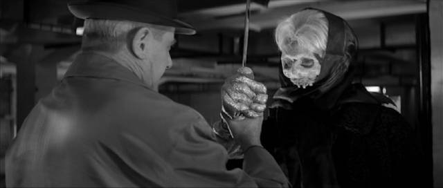 A masked and gloved killer prowls the foggy streets of London in Franz Josef Gottlieb’s The Phantom of Soho (1964)