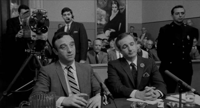 Small-time gangster Harry Plotnick (Martin Priest) testifies before the crime commission in Michael Roemer's The Plot Against Harry (1971)
