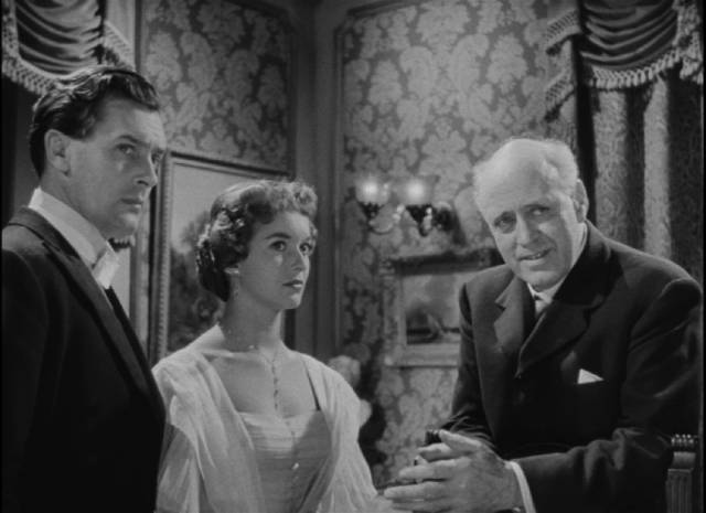 Inspector Poole (Alastair Sim) intrudes on a family celebration in Guy Hamilton's An Inspector Calls (1954)