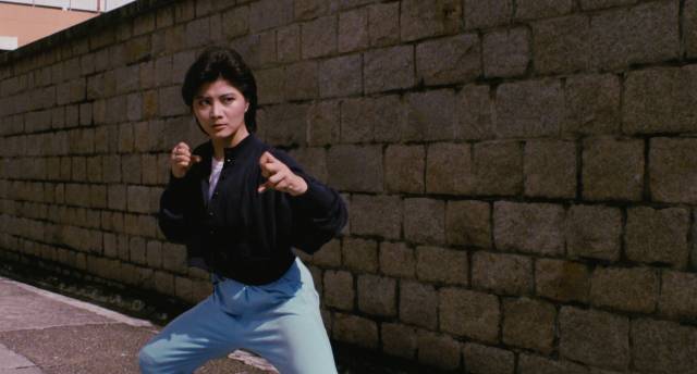 Cynthia Khan is an ambitious police rookie in Arthur Wong's In the Line of Duty III (1988)