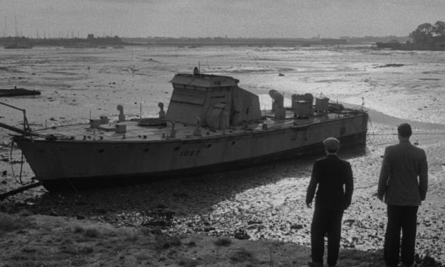 Former shipmates Bill Randall (George Baker) and his second-in-command George Hoskins (Richard Attenborough) salvage their old gunboat in Basil Dearden's The Ship That Died of Shame (1955)
