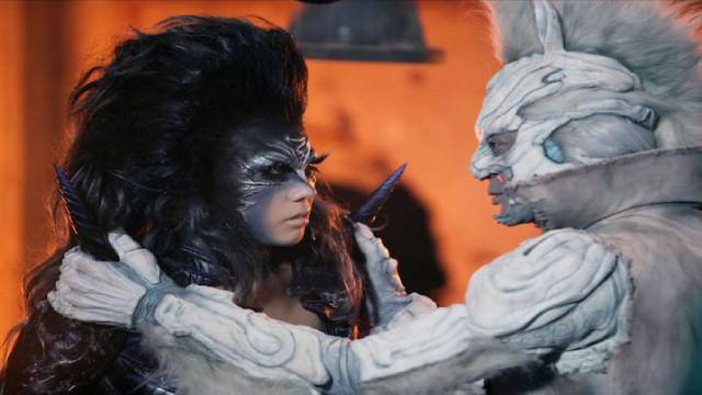 Zebraman confronts his dark alterego Zebra Queen (Riisa Naka) in Takashi Miike's Zebraman 2: Attack on Zebra City (2010)